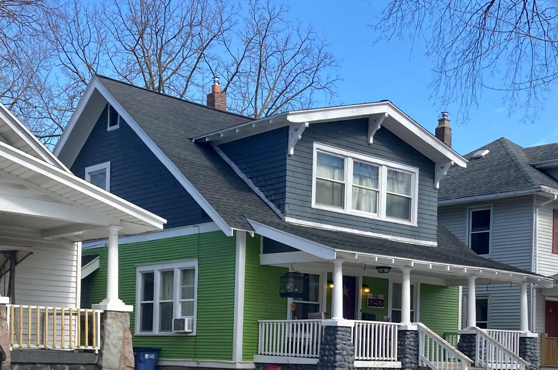 Leaking roof repair on a Grand Rapids home with visible interior water damage